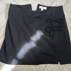 CeCe Black Mini Skirt with Bow Accent